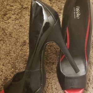 Black peep toe pumps